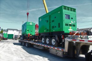 Guardian Tanks Generator Trailer being loaded for shipping
